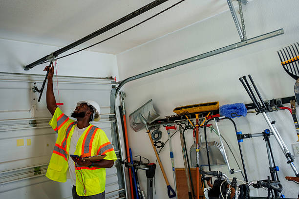 Professional Garage Door Panel Replacement technician working in Urbana, IL